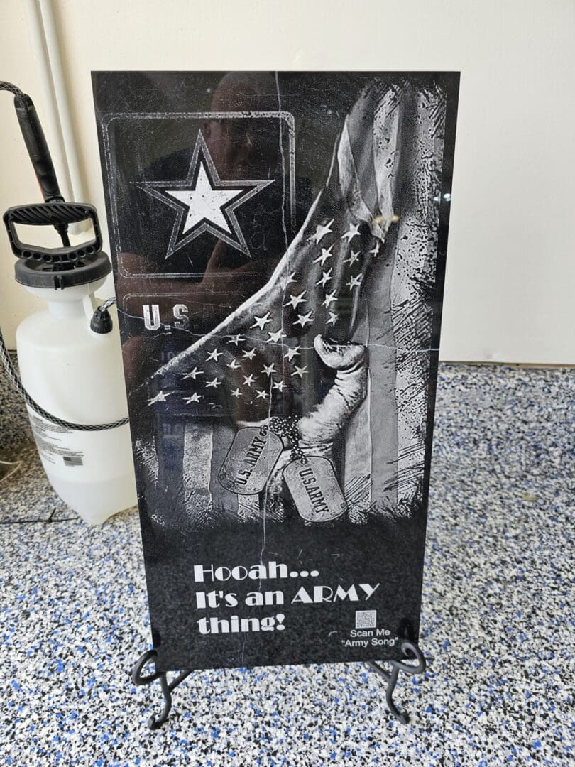 A poster kept on the floor with the word hooah its an armything